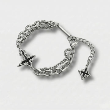 Bracelet en acier à croix sombre moiré